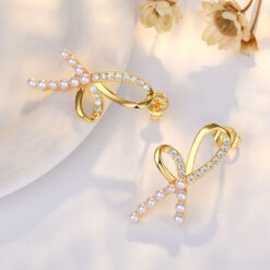 擬珍珠緞帶蝴蝶結鋯石耳環